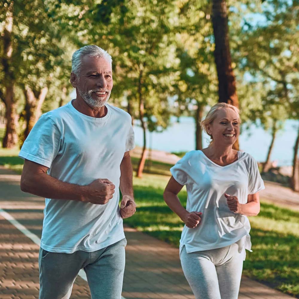 Older adults walking outdoors for fitness
