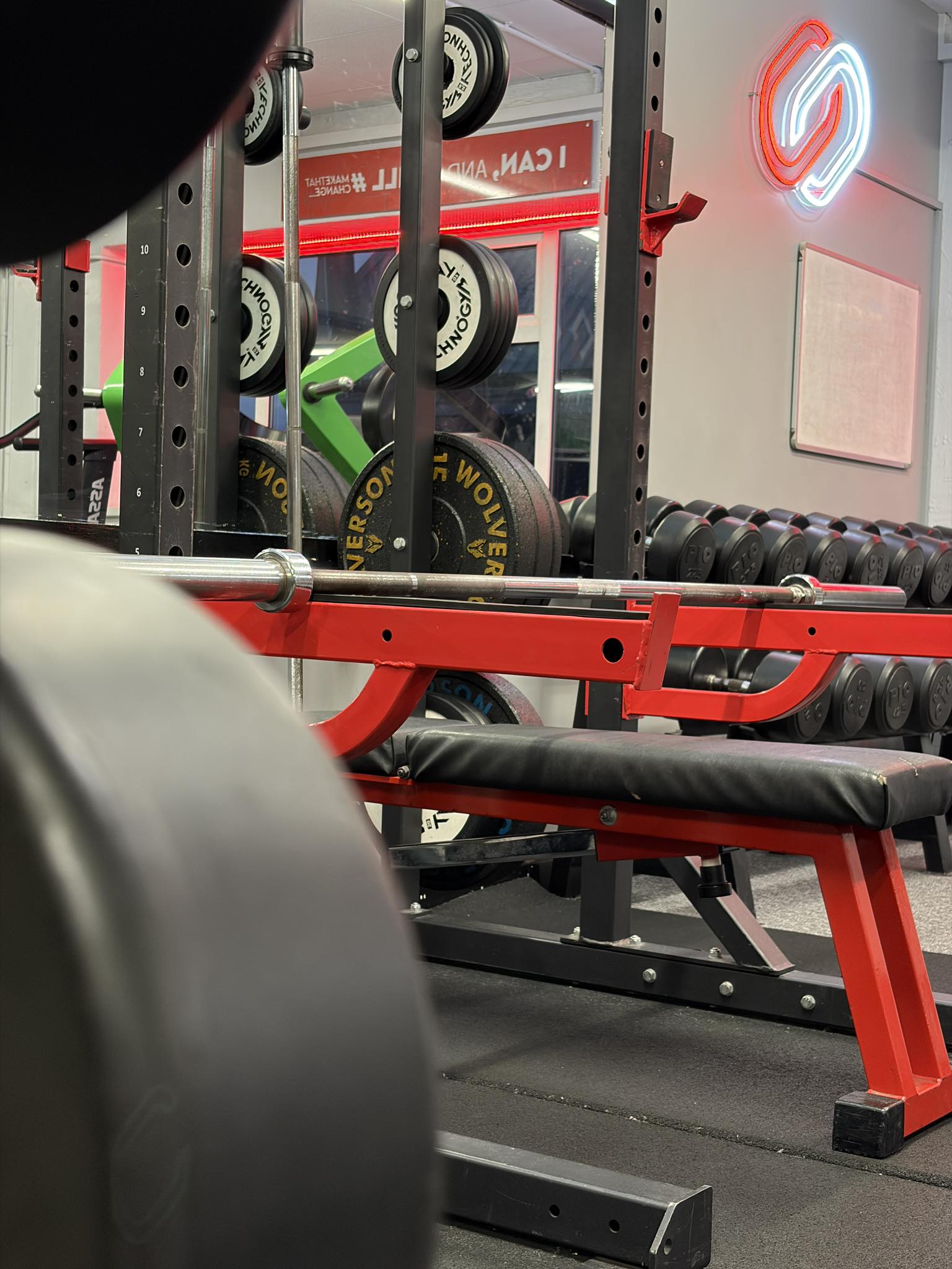 Barbell strength training inside gym