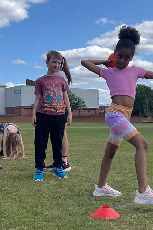 Children participating in outdoor fitness and activity session